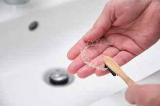 How to clean and care for Invisalign aligners at Romeoville Dental Center in Romeoville, IL